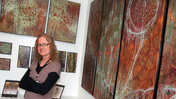 Shelly Hehenberger in front of her work at the tour