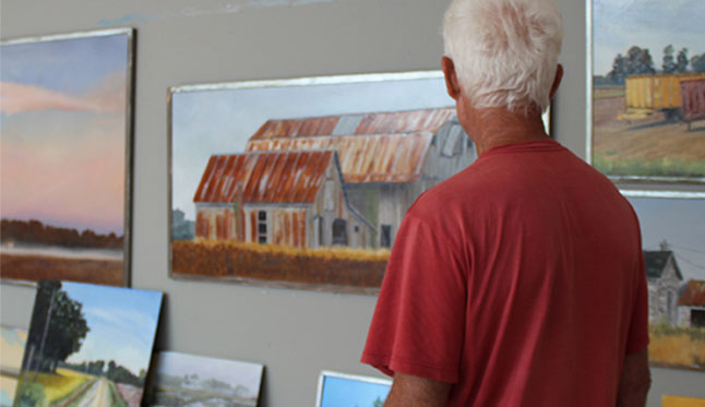 A Visitor Studies Carroll Lassiter's Landscapes