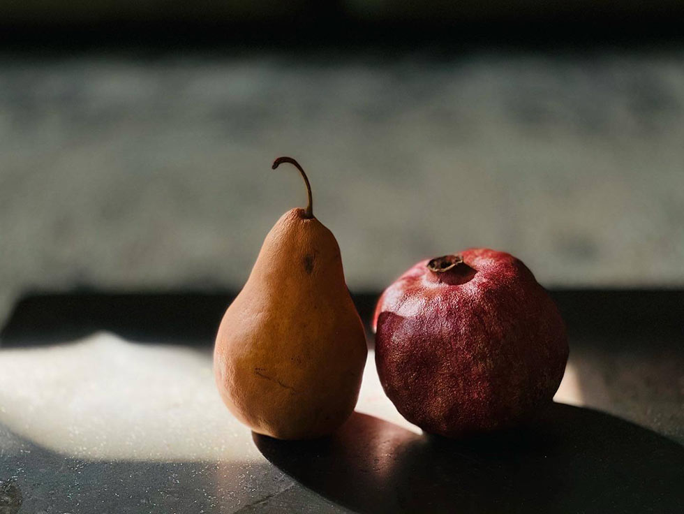 Photo of a pear and pomegranate