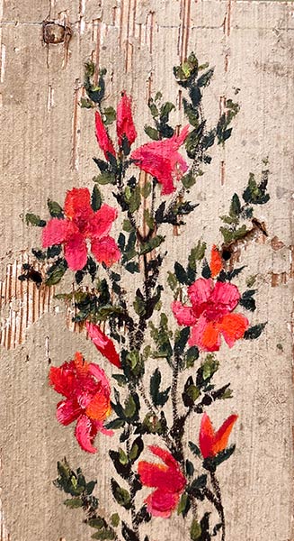 Painting of pink flowers on a piece of wood