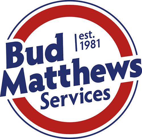 Bud Matthews Services Logo - Navy blue sans-serif type with red and blue bordered circle