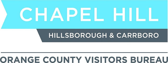 Chapel Hill Orange County Visitors Bureau Logo - White and dark muted blue sans-serif type over cyan and dark muted blue banners